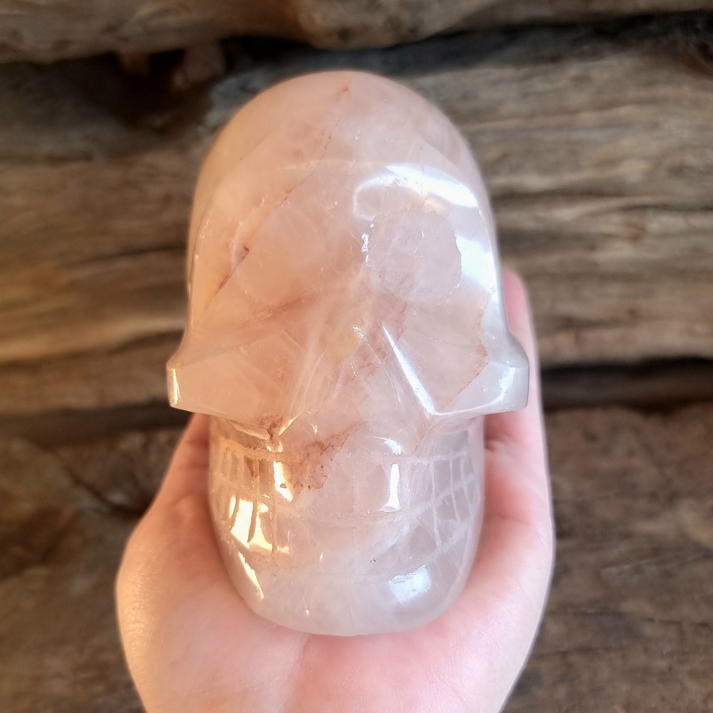 POLISHED RED HEMATOID QUARTZ SCULL A - GROUNDING