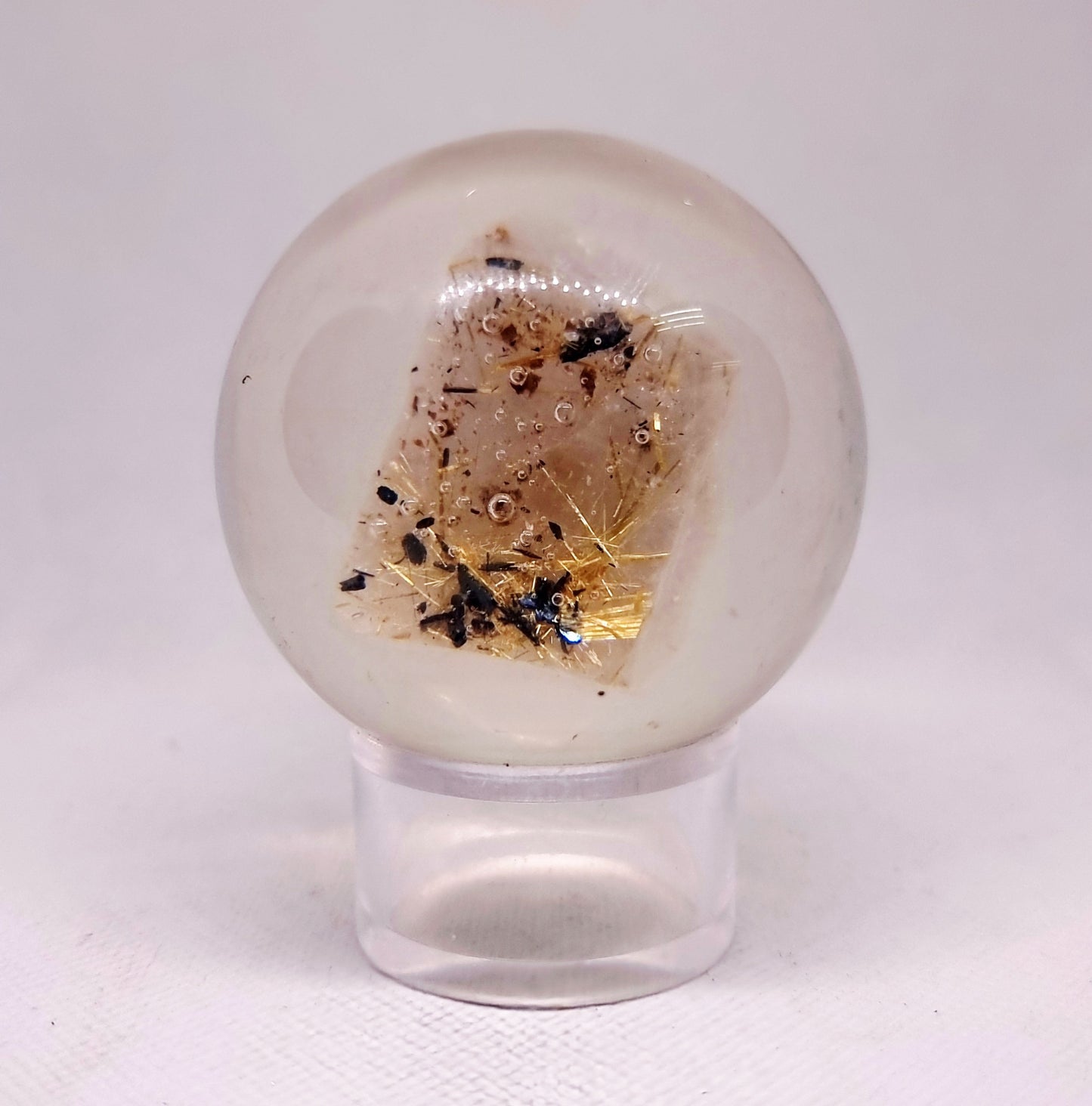 GOLDEN RUTILE QUARTZ IN A RESIN SPHERE 6 cm (205 g) - INTUITION