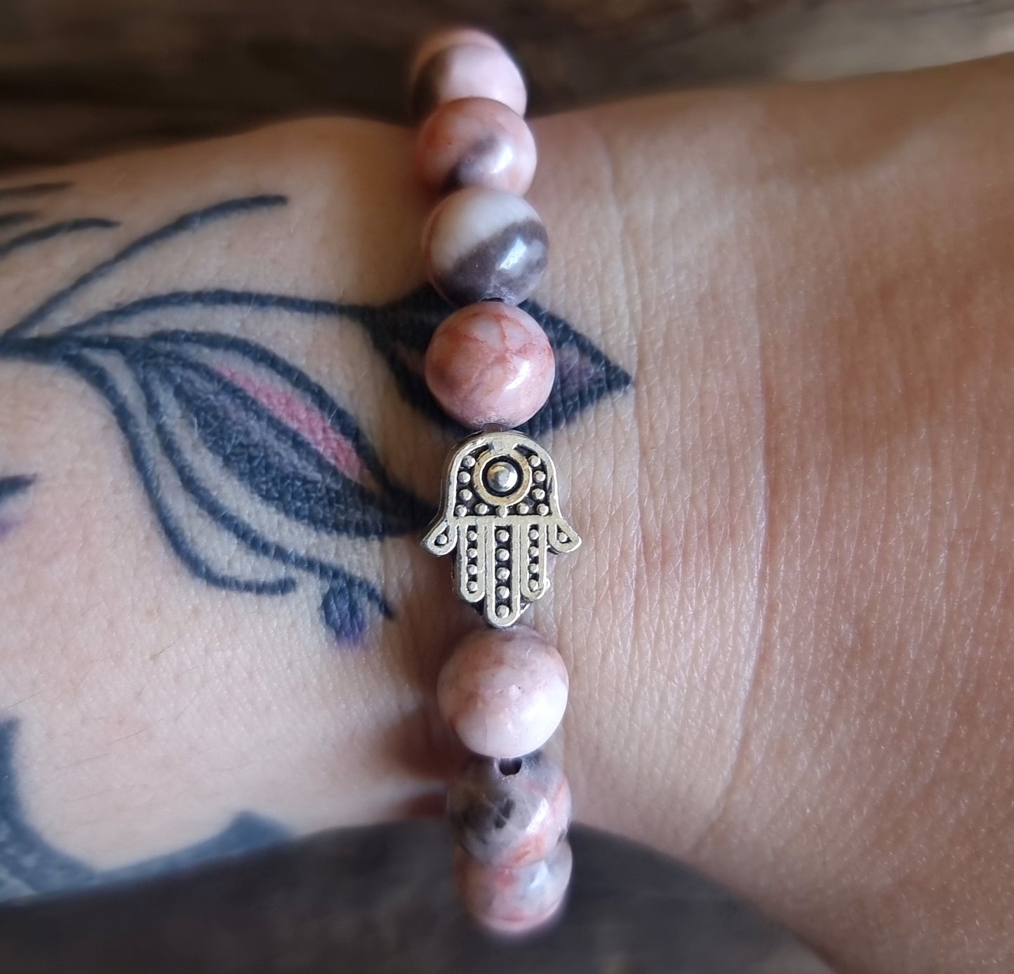 PINK ZEBRA JASPER ENERGY HAMSA HAND BRACELET 8 mm - COURAGE