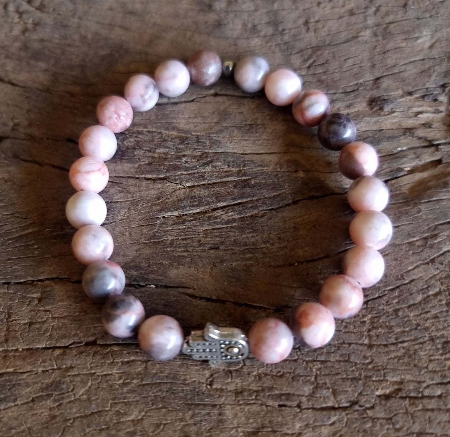 PINK ZEBRA JASPER ENERGY HAMSA HAND BRACELET 8 mm - COURAGE