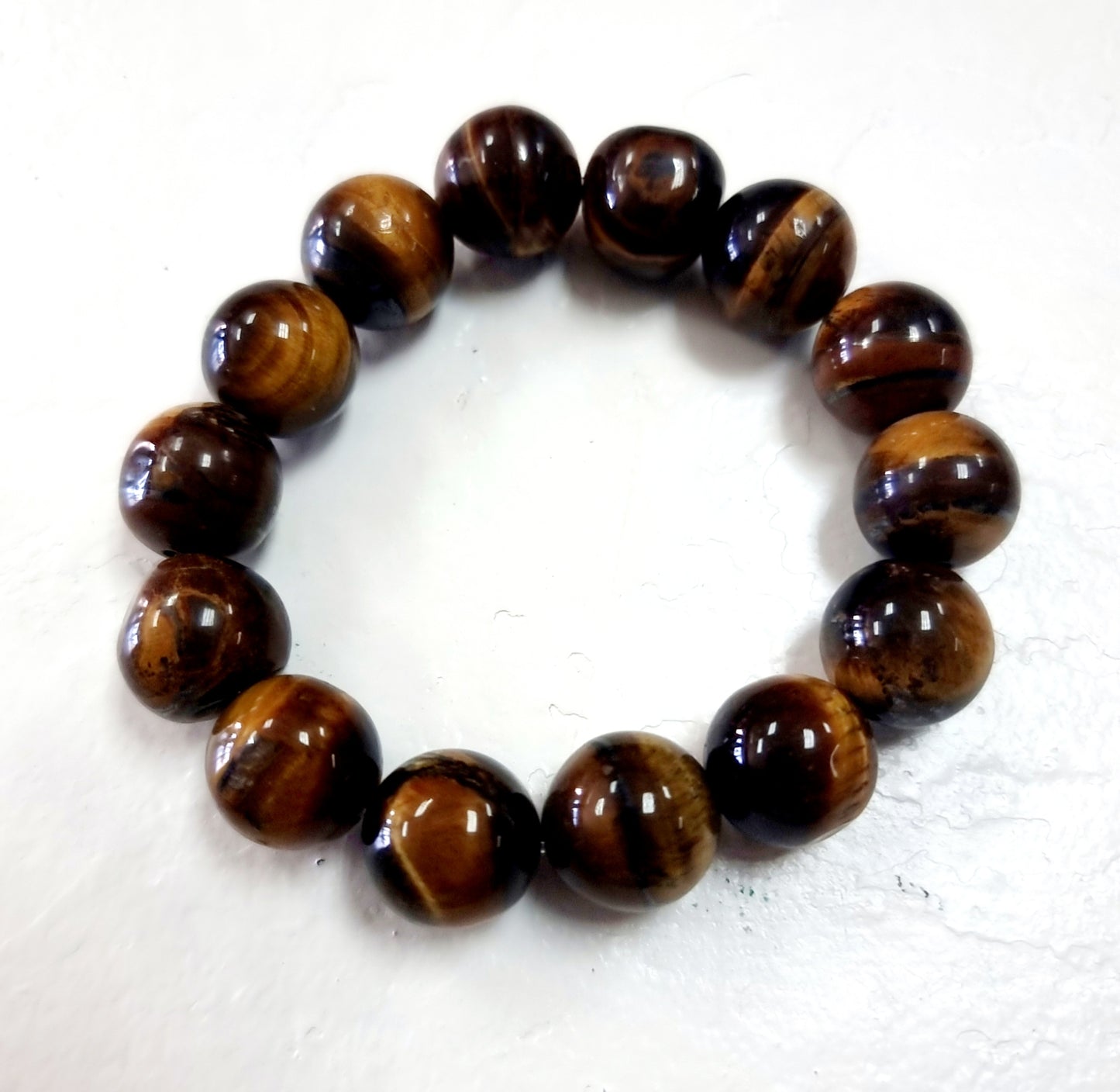 TIGER EYE ENERGY BRACELET 14 mm - PROTECTION & COURAGE