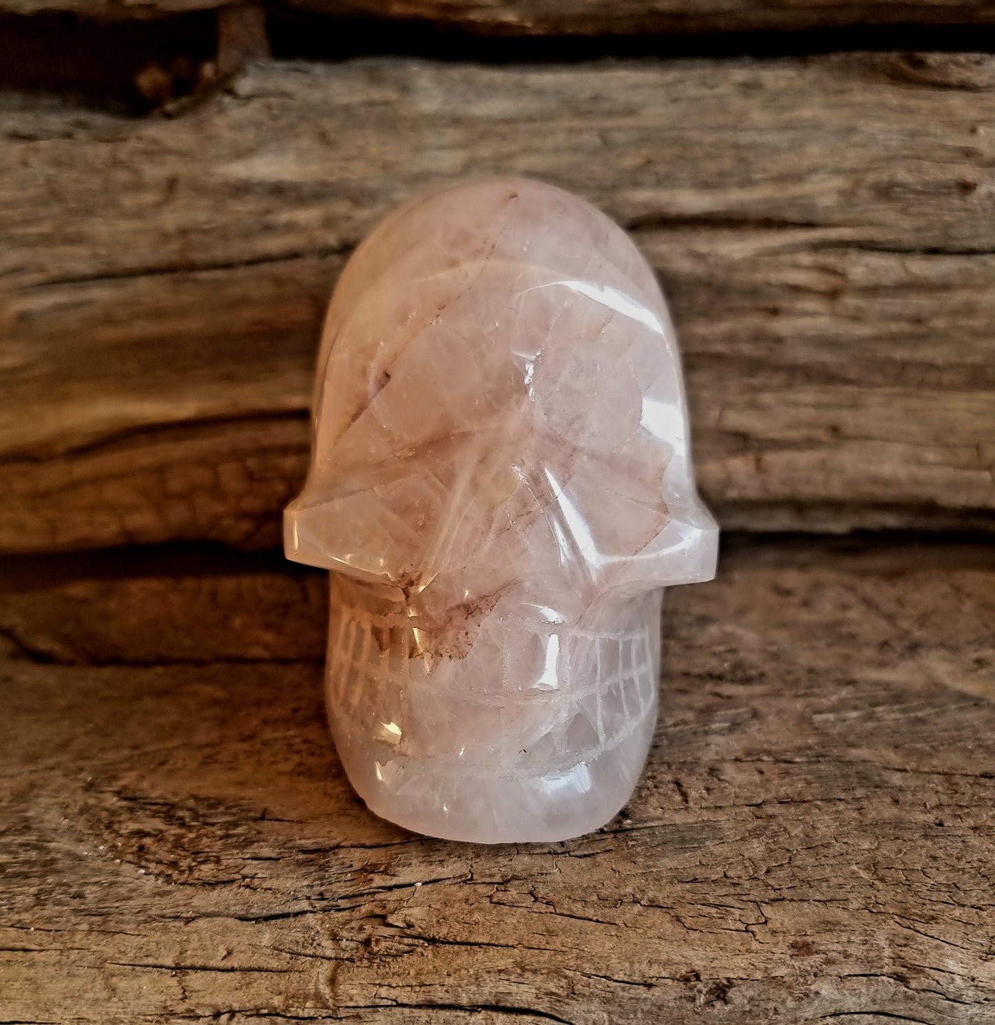 POLISHED RED HEMATOID QUARTZ SCULL A - GROUNDING