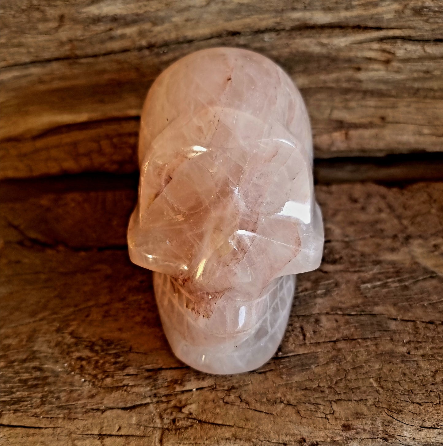 POLISHED RED HEMATOID QUARTZ SCULL A - GROUNDING