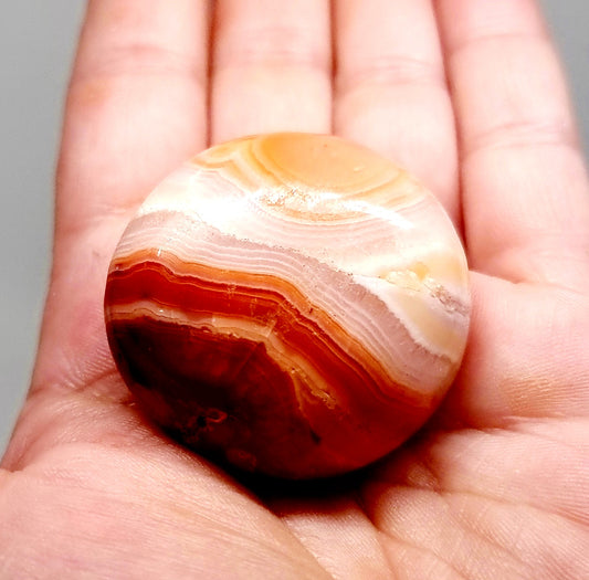 POLISHED CARNELIAN PALMSTONE 56g - CREATIVITY