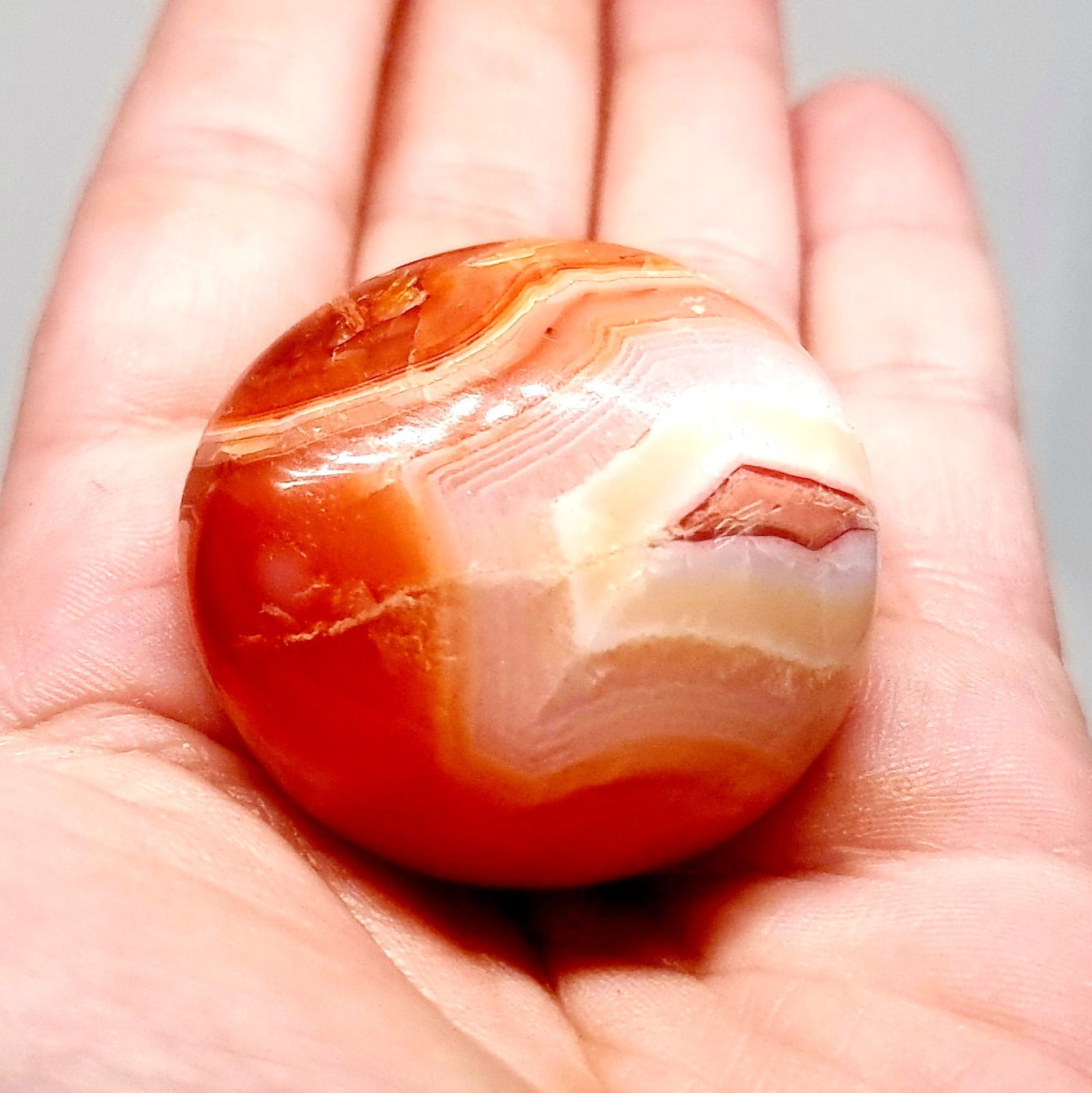 POLISHED CARNELIAN PALMSTONE 56g - CREATIVITY