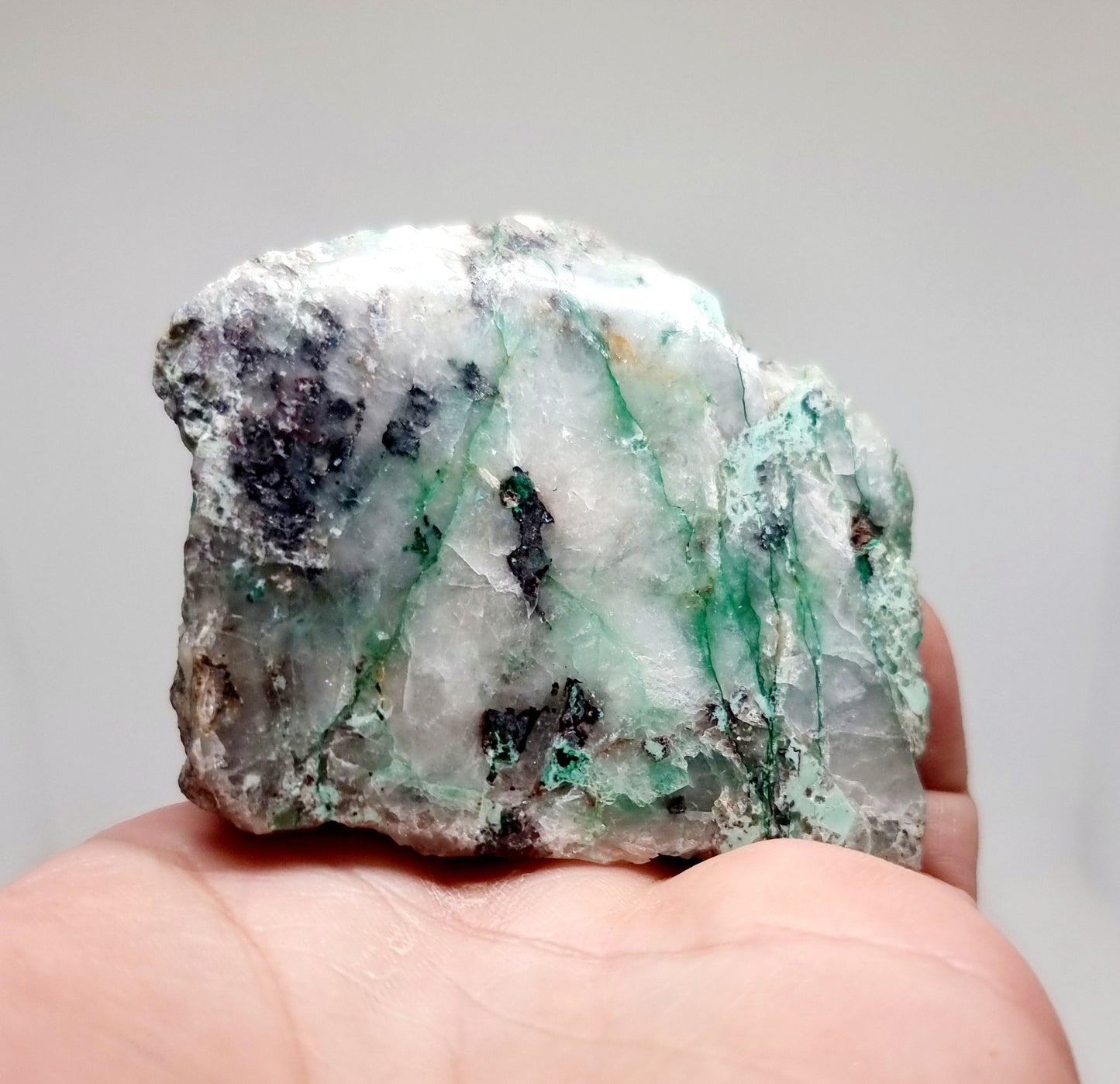 PARTIALLY POLISHED QUARTZ WITH MALACHITE VEINS AND AJOITE INCLUSIONS 129 g