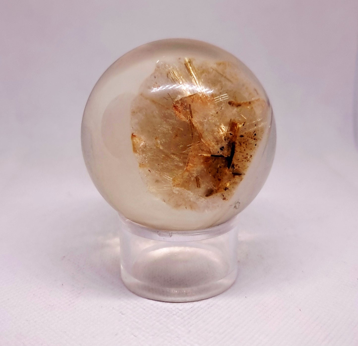 GOLDEN RUTILE QUARTZ IN A RESIN SPHERE 6 cm (179 g)  - INTUITION