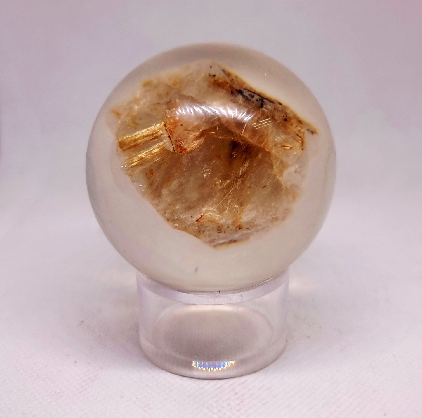 GOLDEN RUTILE QUARTZ IN A RESIN SPHERE 6 cm (179 g)  - INTUITION