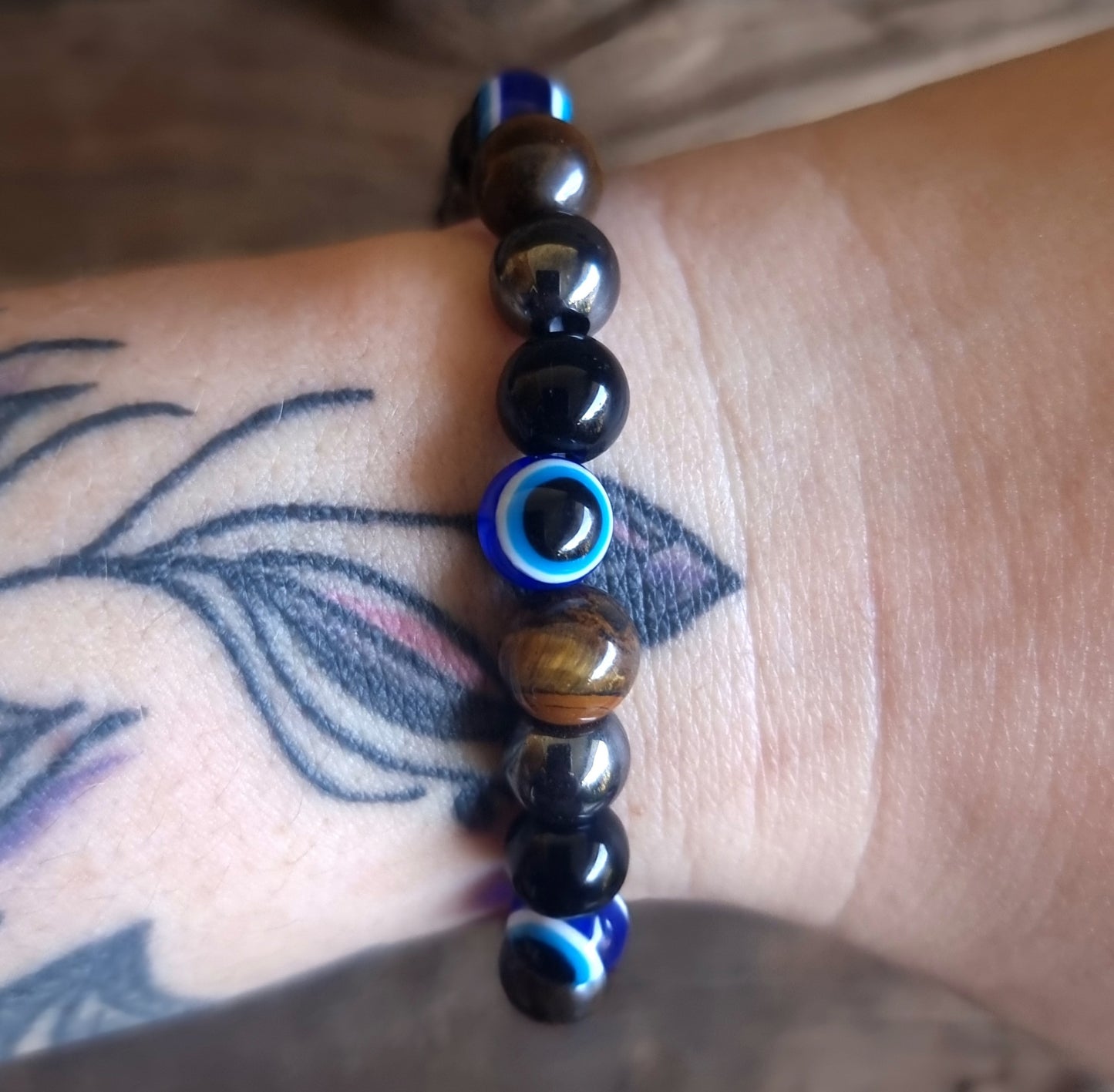 AGAINST EVIL EYE TRIPLE PROTECTION BRACELET 8 mm - TIGER EYE, HEMATITE & OBSIDIAN