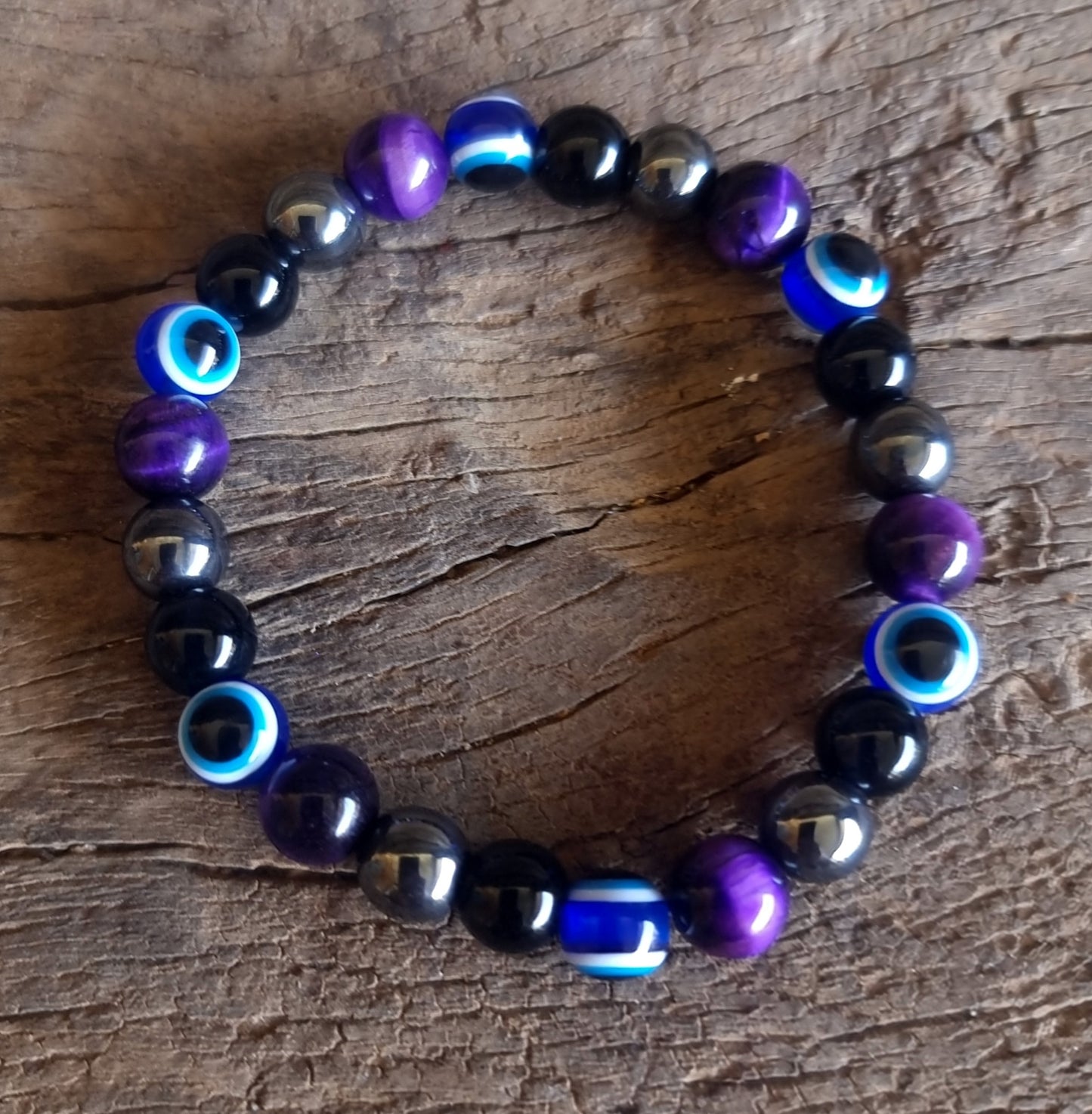 AGAINST EVIL EYE TRIPLE PROTECTION BRACELET 8 mm - PURPLE TIGER EYE, HEMATITE & OBSIDIAN