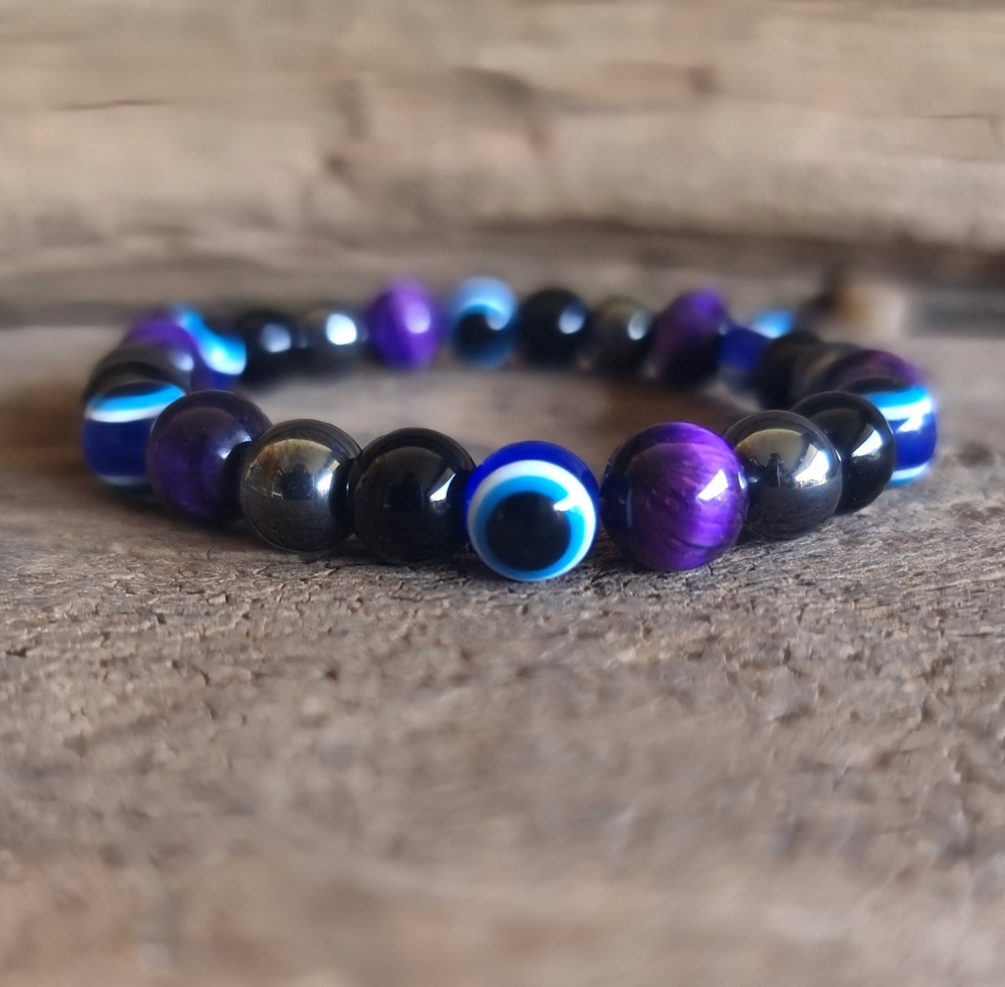 AGAINST EVIL EYE TRIPLE PROTECTION BRACELET 8 mm - PURPLE TIGER EYE, HEMATITE & OBSIDIAN