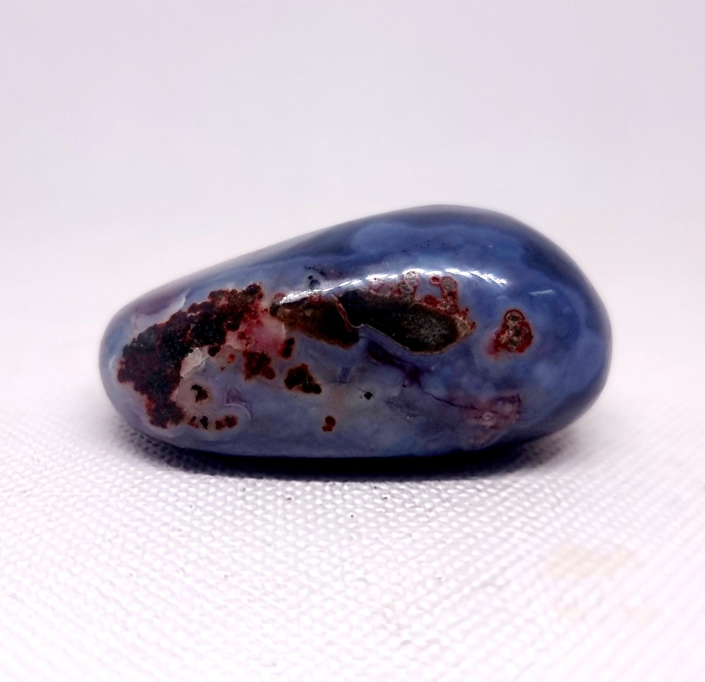 POLISHED RED SASHE RIVER AGATE PALM STONE 107 g - GROUNDING