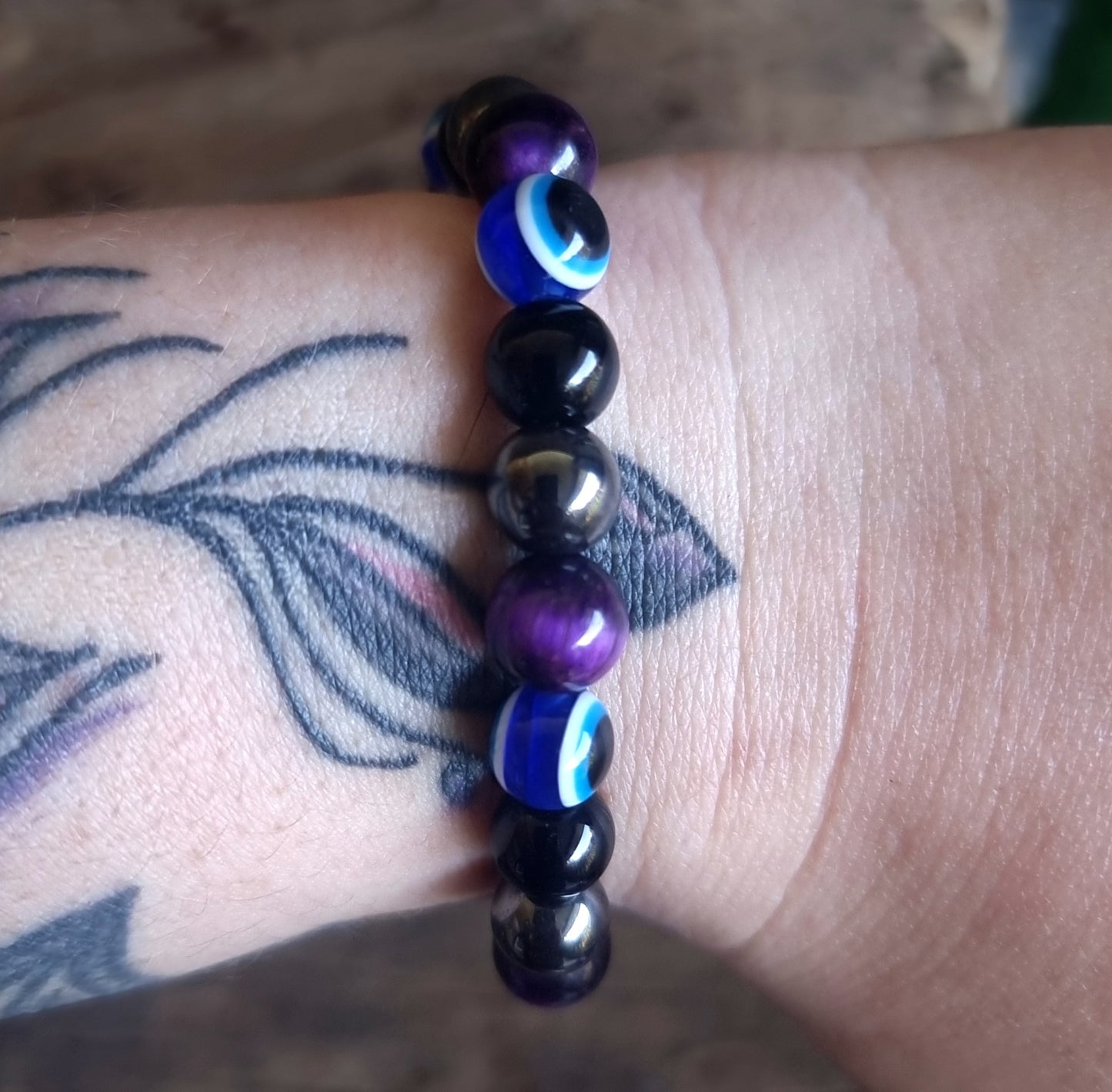 AGAINST EVIL EYE TRIPLE PROTECTION BRACELET 8 mm - PURPLE TIGER EYE, HEMATITE & OBSIDIAN